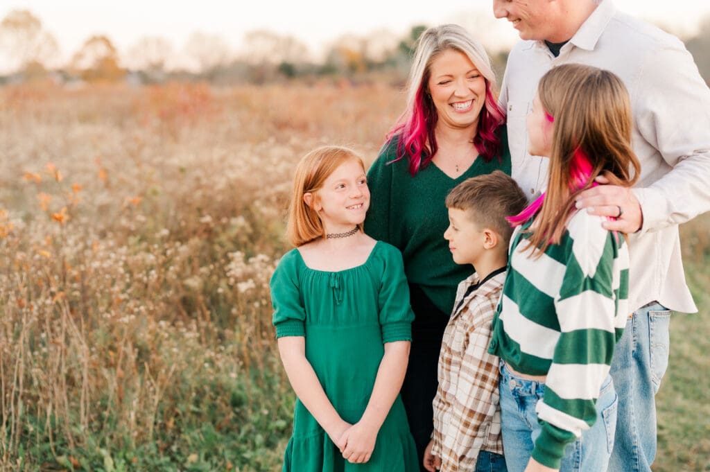 A family photo session at Bay Farm in Duxbury, MA at golden hour. 